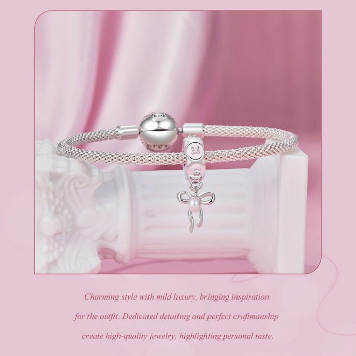 Mayfer |Charm con dise?o coquette decorado con un mo?o - Color Plateado. - Imagen 5